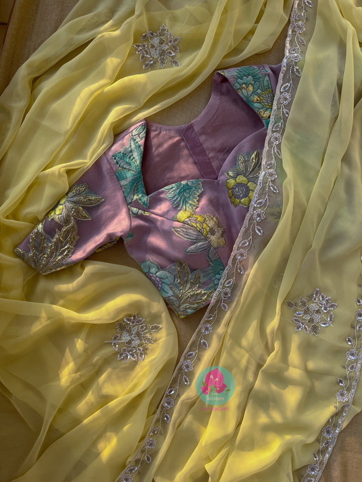 Soft Yellow viscous georgette saree with beautiful hand embroidery