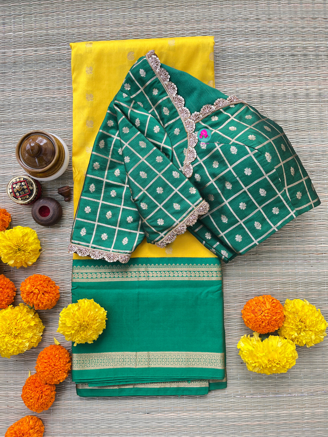 Yellow saree with green border