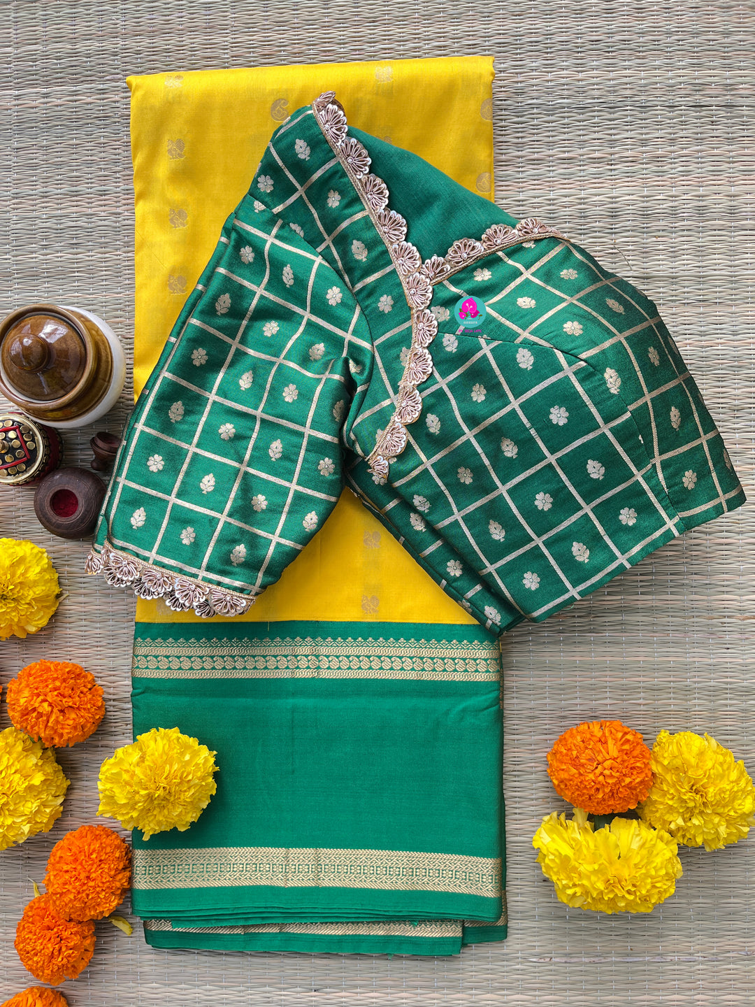 Yellow saree with green border