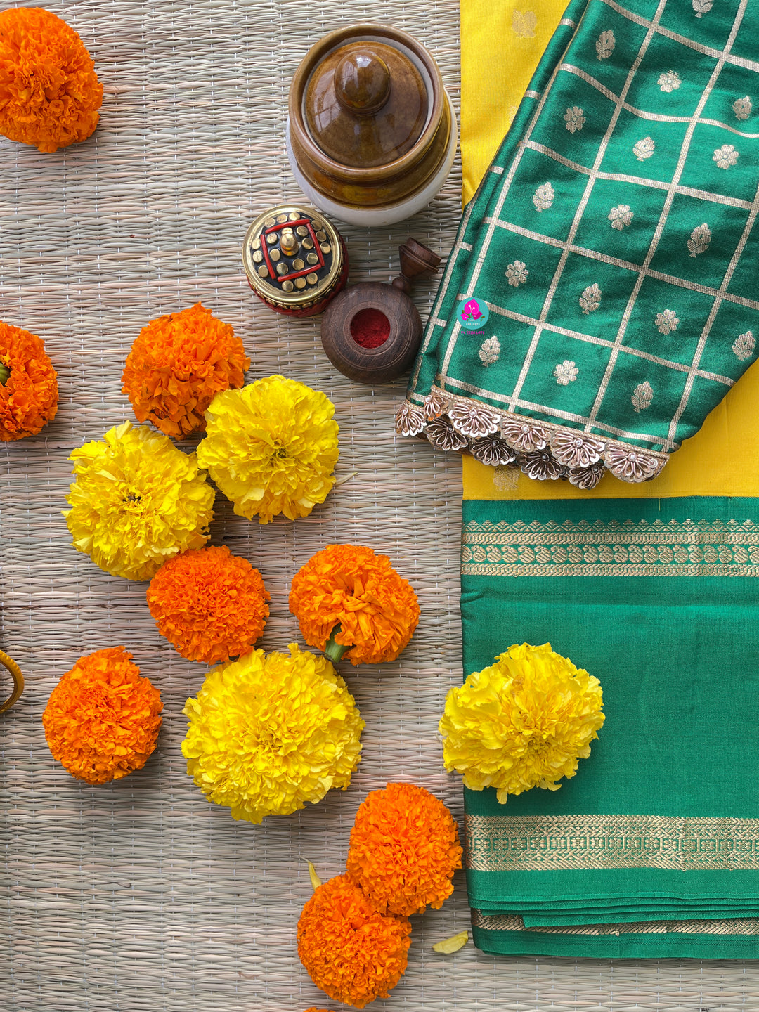 Yellow saree with green border