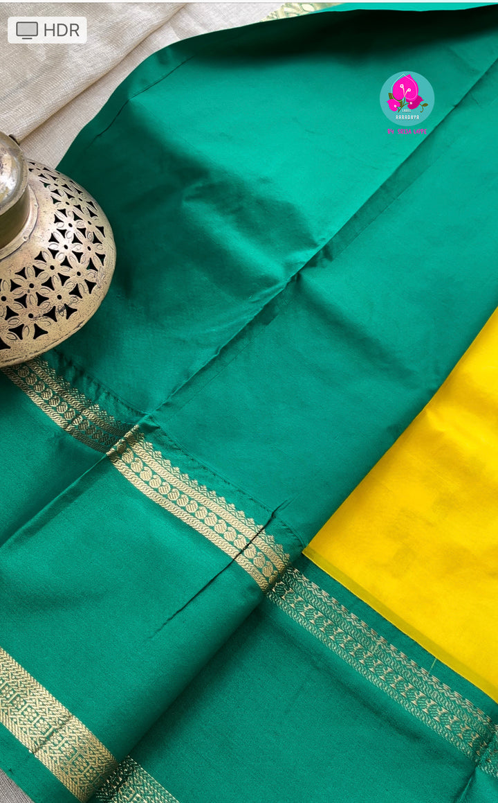 Yellow saree with green border